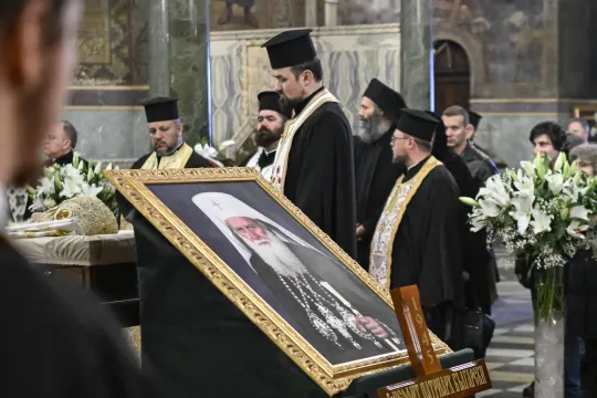Priests pay respect to late Patriarch Neophyte of Bulgaria's Orthodox Church during a funeral service at the golden-domed "Alexander Nevski" cathedral in Sofia on March 15, 2024. Bulgaria bid its last farewell to its Christian Orthodox religious leader Patriarch Neophyte, who died on March 13 at the age of 78. Nikolay DOYCHINOV / AFP