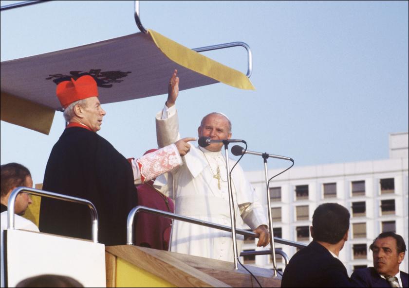 A file photo taken 02 June 1979 shows Pope John Paul II (C) and the head of the Catholic church in Poland, Cardinal-Archbishop Stefan Wyszynski (L), waving at faithful in Warsaw during the pontiff's first visit to Poland. Pope Benedict XVI will travel to Poland as of 25 May 2006 on a pilgrimage to the homeland of his hugely popular predecessor John Paul II, where he will also pay an emotional tribute at the Nazi death camp of Auschwitz. AFP PHOTO