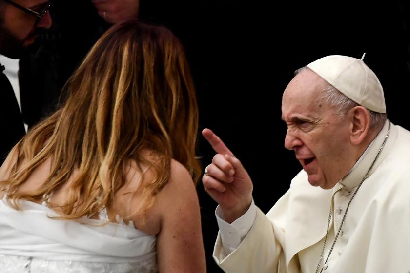 Pope Francis gestures as he speaks to newlyweds during the weekly general general audience at Paul-VI Hall in the Vatican on January 26, 2021. 