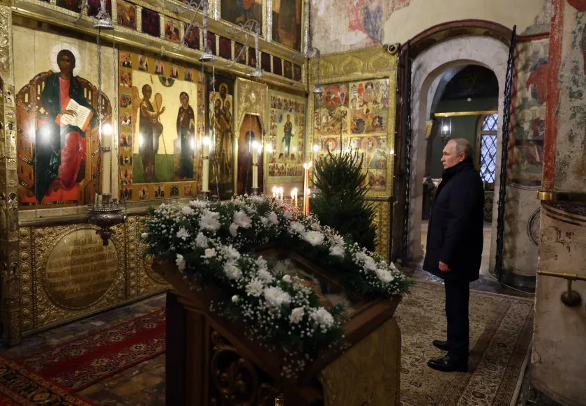 Russian President Vladimir Putin attends an Orthodox Christmas mass in the Cathedral of the Annunciation at the Kremlin in Moscow, late on January 6, 2023. Mikhail KLIMENTYEV / SPUTNIK / AFP