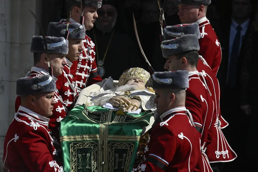 Honor guards carry the coffin of the late Patriarch Neophyte of Bulgaria's Orthodox Church, during a funeral procession from the golden-domed "Alexander Nevski" cathedral to his burial place in the "St. Nedelya", in Sofia, on March 16, 2024. Bulgaria bid its last farewell to its Christian Orthodox religious leader Patriarch Neophyte, who died on March 13 at the age of 78. Nikolay DOYCHINOV / AFP